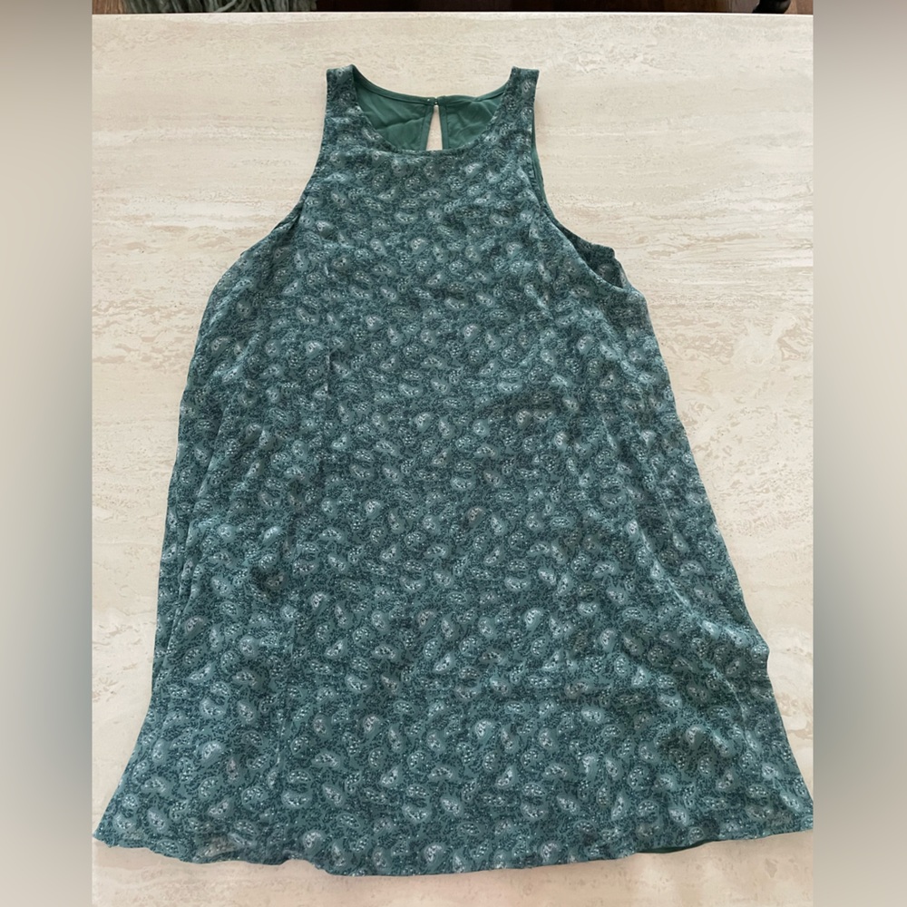 A beautiful green floral tank top dress